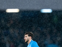 Khvicha Kvaratskhelia of SSC Napoli reacts in the rain during the serie Serie A Enilive match between SSC Napoli and SS Lazio at Stadio Dieg...