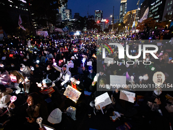 Thousands of citizens gather across from the National Assembly to call for the impeachment of President Yoon Suk-yeol in Seoul, South Korea,...