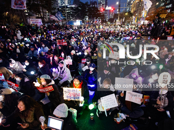 Thousands of citizens gather across from the National Assembly to call for the impeachment of President Yoon Suk-yeol in Seoul, South Korea,...