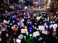 Thousands of citizens gather across from the National Assembly to call for the impeachment of President Yoon Suk-yeol in Seoul, South Korea,...