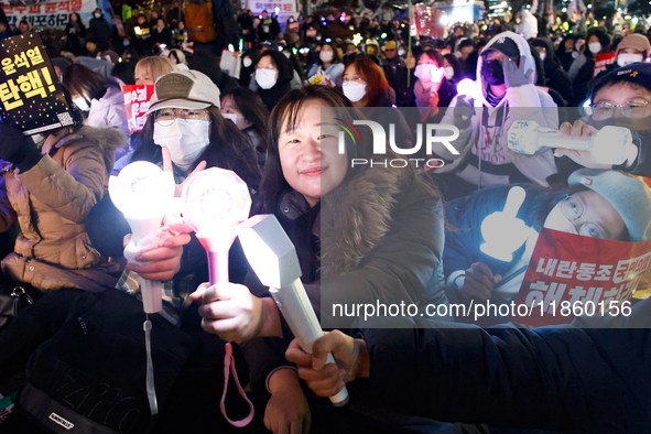 Thousands of citizens gather across from the National Assembly to call for the impeachment of President Yoon Suk-yeol in Seoul, South Korea,...