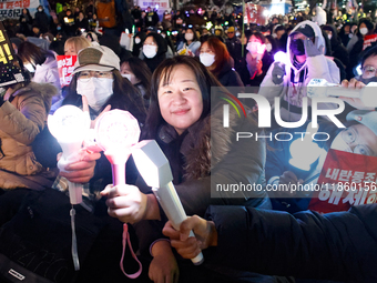 Thousands of citizens gather across from the National Assembly to call for the impeachment of President Yoon Suk-yeol in Seoul, South Korea,...