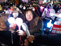 Thousands of citizens gather across from the National Assembly to call for the impeachment of President Yoon Suk-yeol in Seoul, South Korea,...