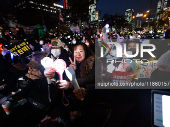 Thousands of citizens gather across from the National Assembly to call for the impeachment of President Yoon Suk-yeol in Seoul, South Korea,...