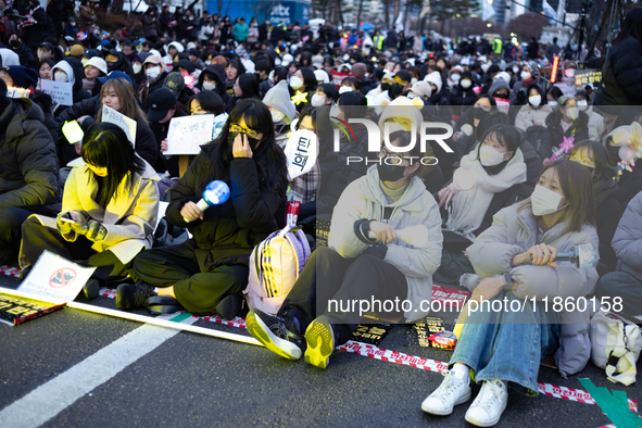 Thousands of citizens gather across from the National Assembly to call for the impeachment of President Yoon Suk-yeol in Seoul, South Korea,...