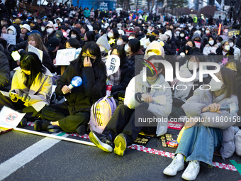 Thousands of citizens gather across from the National Assembly to call for the impeachment of President Yoon Suk-yeol in Seoul, South Korea,...