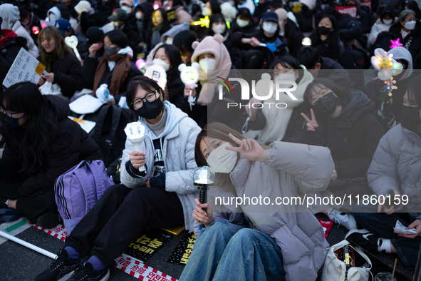 Thousands of citizens gather across from the National Assembly to call for the impeachment of President Yoon Suk-yeol in Seoul, South Korea,...