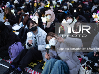 Thousands of citizens gather across from the National Assembly to call for the impeachment of President Yoon Suk-yeol in Seoul, South Korea,...