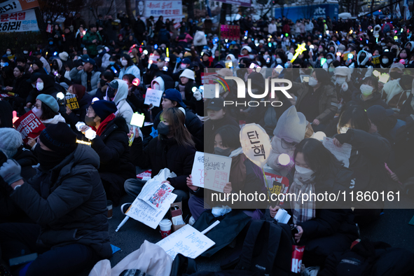 Thousands of citizens gather across from the National Assembly to call for the impeachment of President Yoon Suk-yeol in Seoul, South Korea,...