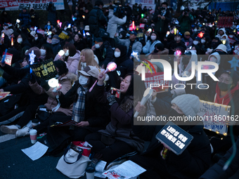 Thousands of citizens gather across from the National Assembly to call for the impeachment of President Yoon Suk-yeol in Seoul, South Korea,...