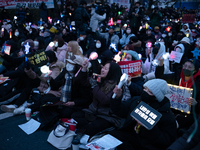 Thousands of citizens gather across from the National Assembly to call for the impeachment of President Yoon Suk-yeol in Seoul, South Korea,...