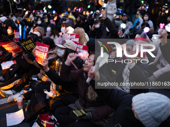 Thousands of citizens gather across from the National Assembly to call for the impeachment of President Yoon Suk-yeol in Seoul, South Korea,...