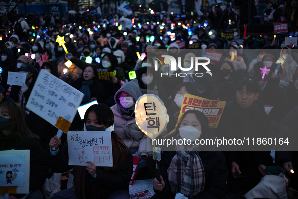 Thousands of citizens gather across from the National Assembly to call for the impeachment of President Yoon Suk-yeol in Seoul, South Korea,...