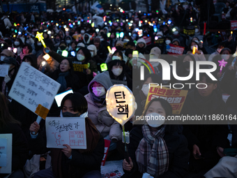 Thousands of citizens gather across from the National Assembly to call for the impeachment of President Yoon Suk-yeol in Seoul, South Korea,...