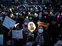 Thousands of citizens gather across from the National Assembly to call for the impeachment of President Yoon Suk-yeol in Seoul, South Korea,...