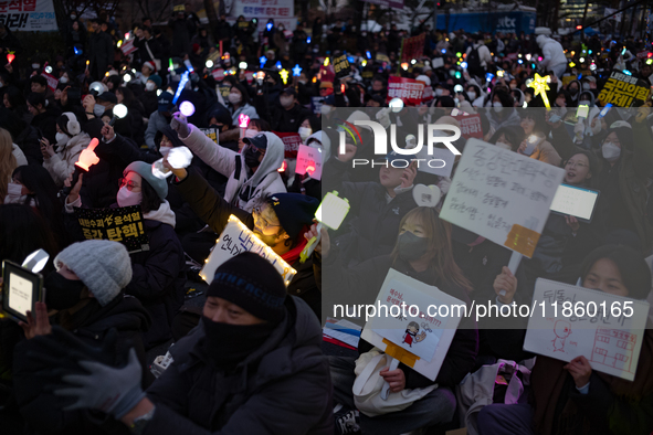 Thousands of citizens gather across from the National Assembly to call for the impeachment of President Yoon Suk-yeol in Seoul, South Korea,...