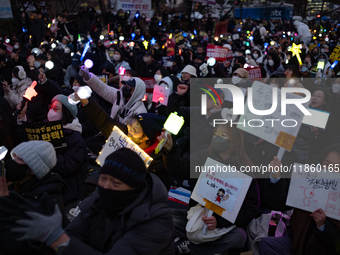 Thousands of citizens gather across from the National Assembly to call for the impeachment of President Yoon Suk-yeol in Seoul, South Korea,...