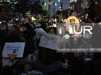 Thousands of citizens gather across from the National Assembly to call for the impeachment of President Yoon Suk-yeol in Seoul, South Korea,...