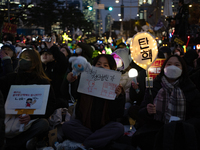 Thousands of citizens gather across from the National Assembly to call for the impeachment of President Yoon Suk-yeol in Seoul, South Korea,...