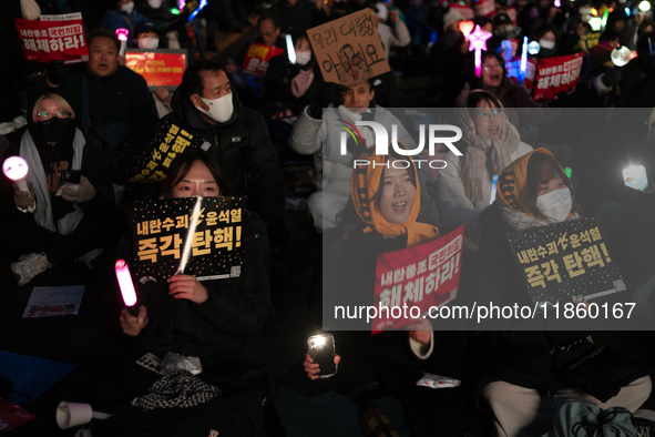 Thousands of citizens gather across from the National Assembly to call for the impeachment of President Yoon Suk-yeol in Seoul, South Korea,...