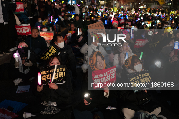 Thousands of citizens gather across from the National Assembly to call for the impeachment of President Yoon Suk-yeol in Seoul, South Korea,...