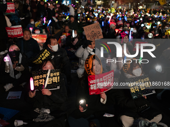 Thousands of citizens gather across from the National Assembly to call for the impeachment of President Yoon Suk-yeol in Seoul, South Korea,...