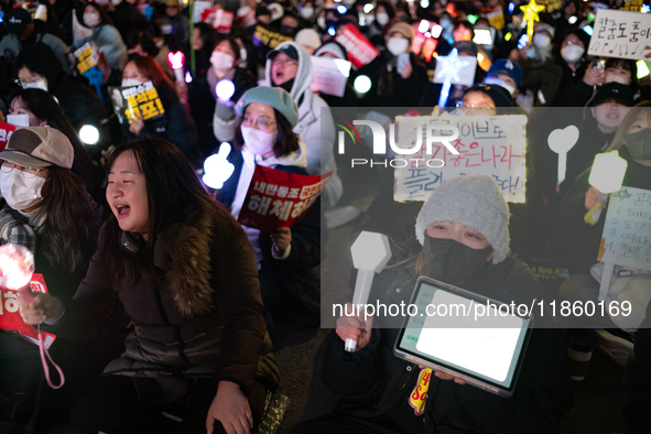 Thousands of citizens gather across from the National Assembly to call for the impeachment of President Yoon Suk-yeol in Seoul, South Korea,...