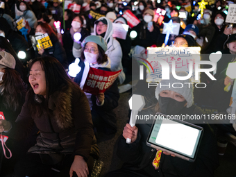 Thousands of citizens gather across from the National Assembly to call for the impeachment of President Yoon Suk-yeol in Seoul, South Korea,...