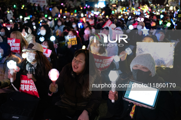 Thousands of citizens gather across from the National Assembly to call for the impeachment of President Yoon Suk-yeol in Seoul, South Korea,...