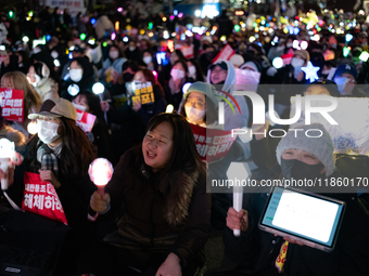 Thousands of citizens gather across from the National Assembly to call for the impeachment of President Yoon Suk-yeol in Seoul, South Korea,...