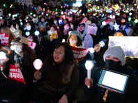 Thousands of citizens gather across from the National Assembly to call for the impeachment of President Yoon Suk-yeol in Seoul, South Korea,...