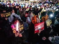 Thousands of citizens gather across from the National Assembly to call for the impeachment of President Yoon Suk-yeol in Seoul, South Korea,...