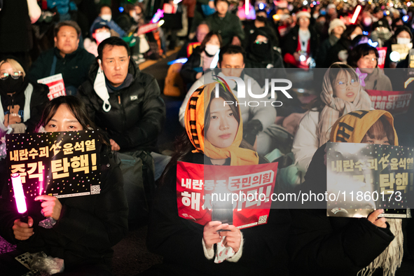 Thousands of citizens gather across from the National Assembly to call for the impeachment of President Yoon Suk-yeol in Seoul, South Korea,...