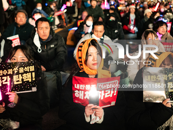 Thousands of citizens gather across from the National Assembly to call for the impeachment of President Yoon Suk-yeol in Seoul, South Korea,...