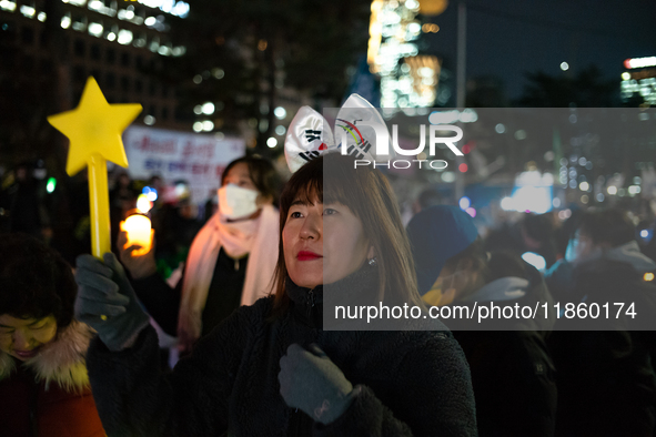 Thousands of citizens gather across from the National Assembly to call for the impeachment of President Yoon Suk-yeol in Seoul, South Korea,...