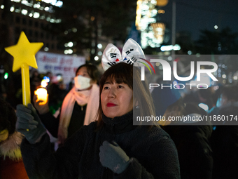 Thousands of citizens gather across from the National Assembly to call for the impeachment of President Yoon Suk-yeol in Seoul, South Korea,...