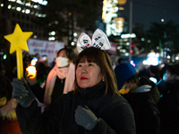 Thousands of citizens gather across from the National Assembly to call for the impeachment of President Yoon Suk-yeol in Seoul, South Korea,...