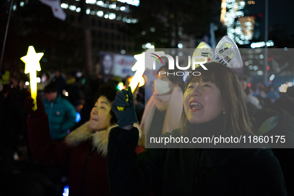 Thousands of citizens gather across from the National Assembly to call for the impeachment of President Yoon Suk-yeol in Seoul, South Korea,...