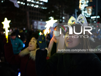 Thousands of citizens gather across from the National Assembly to call for the impeachment of President Yoon Suk-yeol in Seoul, South Korea,...