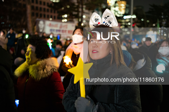 Thousands of citizens gather across from the National Assembly to call for the impeachment of President Yoon Suk-yeol in Seoul, South Korea,...