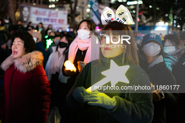 Thousands of citizens gather across from the National Assembly to call for the impeachment of President Yoon Suk-yeol in Seoul, South Korea,...