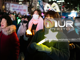 Thousands of citizens gather across from the National Assembly to call for the impeachment of President Yoon Suk-yeol in Seoul, South Korea,...