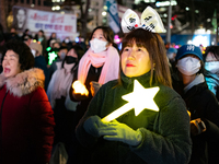 Thousands of citizens gather across from the National Assembly to call for the impeachment of President Yoon Suk-yeol in Seoul, South Korea,...