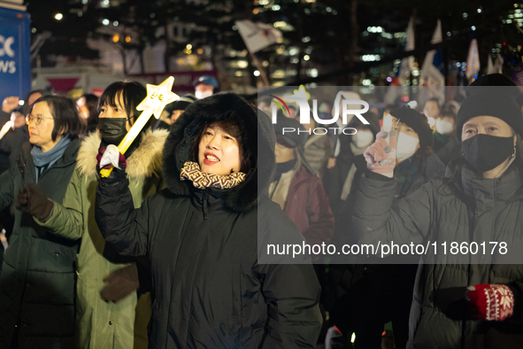 Thousands of citizens gather across from the National Assembly to call for the impeachment of President Yoon Suk-yeol in Seoul, South Korea,...