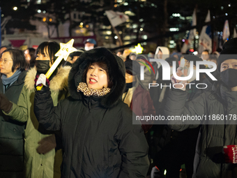 Thousands of citizens gather across from the National Assembly to call for the impeachment of President Yoon Suk-yeol in Seoul, South Korea,...