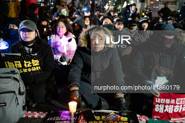 Thousands of citizens gather across from the National Assembly to call for the impeachment of President Yoon Suk-yeol in Seoul, South Korea,...