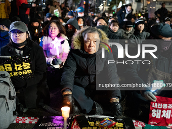 Thousands of citizens gather across from the National Assembly to call for the impeachment of President Yoon Suk-yeol in Seoul, South Korea,...