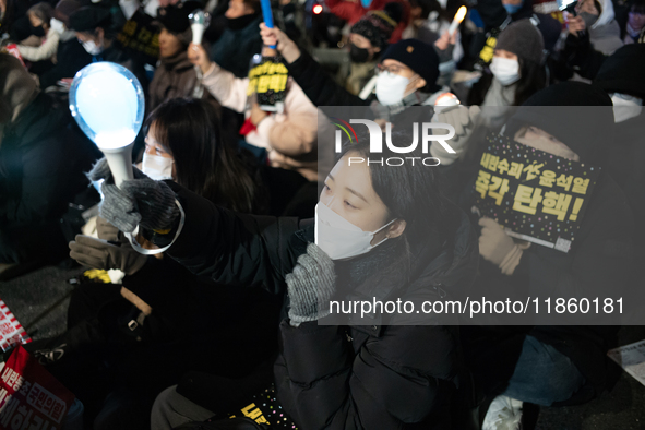 Thousands of citizens gather across from the National Assembly to call for the impeachment of President Yoon Suk-yeol in Seoul, South Korea,...