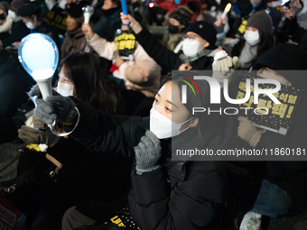 Thousands of citizens gather across from the National Assembly to call for the impeachment of President Yoon Suk-yeol in Seoul, South Korea,...