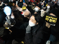 Thousands of citizens gather across from the National Assembly to call for the impeachment of President Yoon Suk-yeol in Seoul, South Korea,...